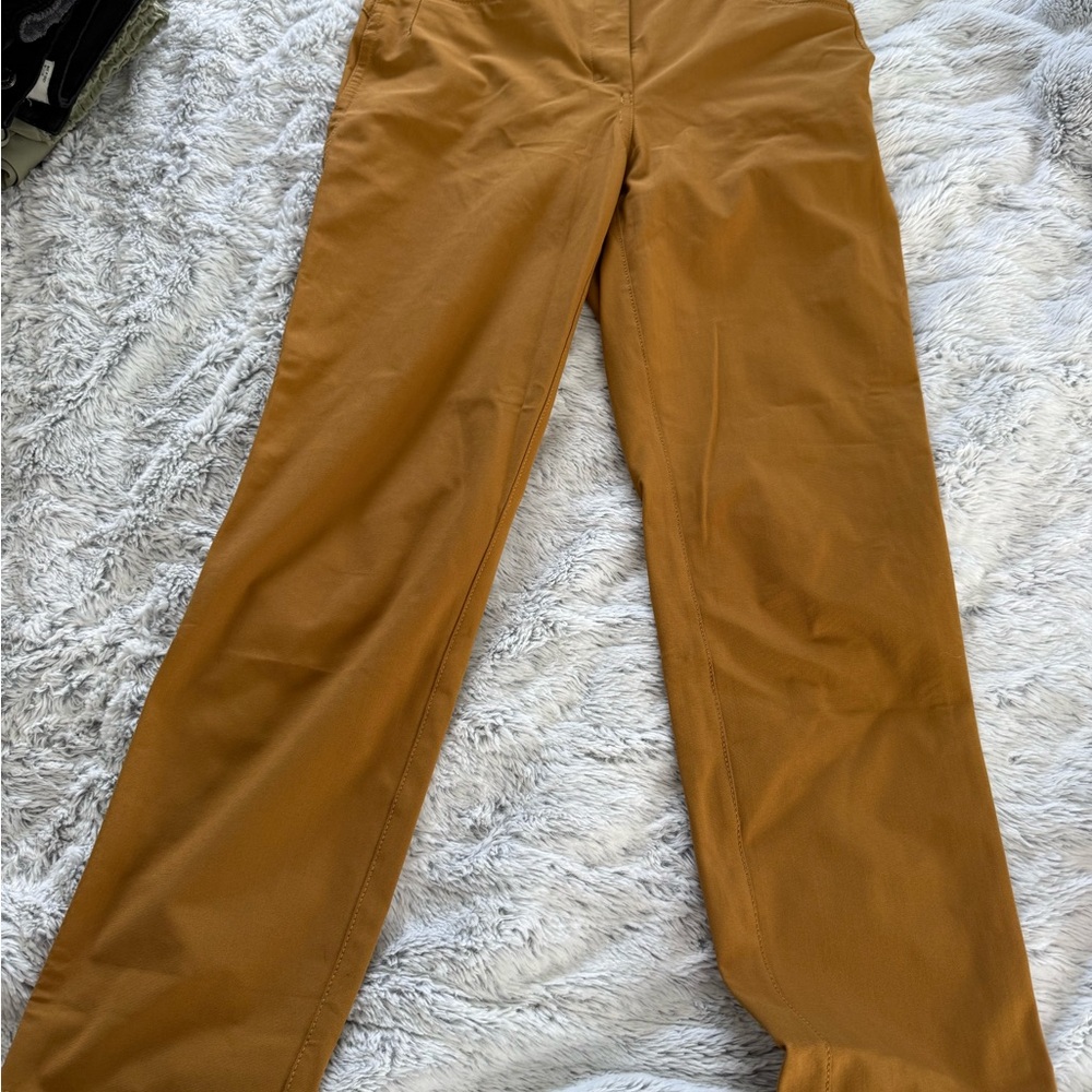 Women’s mustard colored pants.
